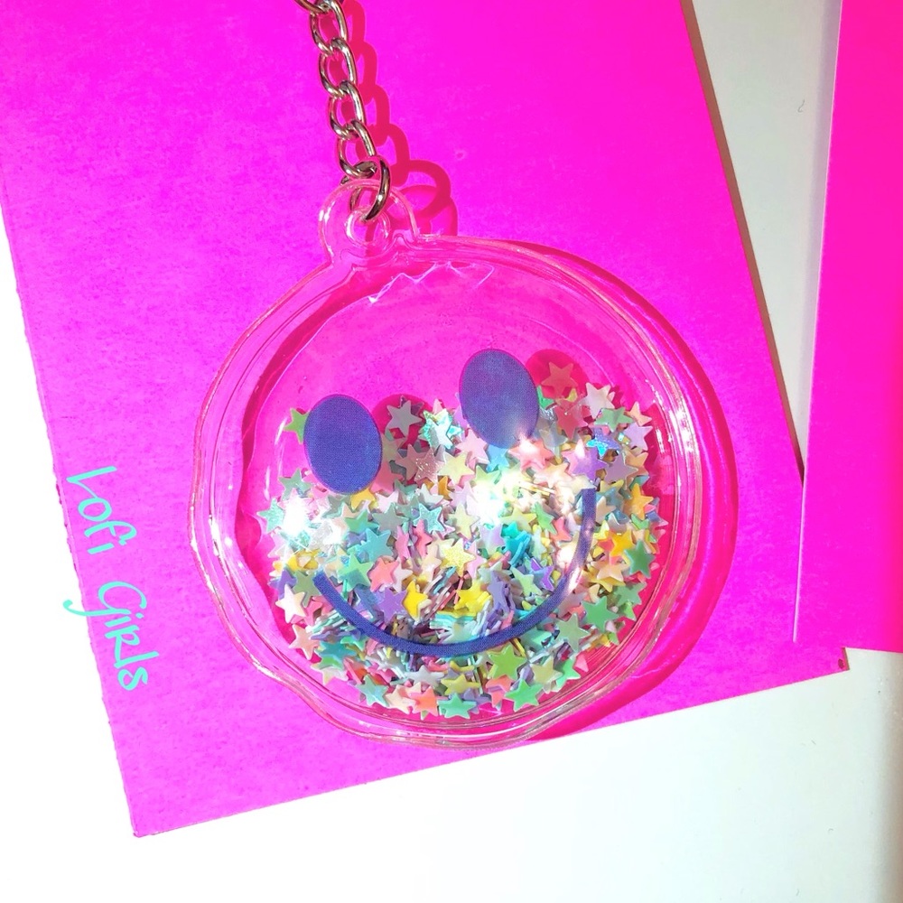 Groove With The Stars Smiley Face Bubble Charm Key Chain